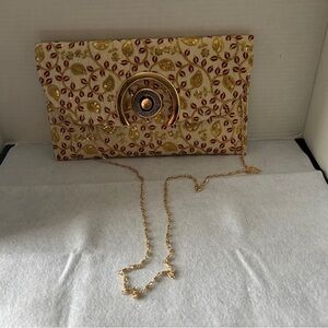 Elegant Gold and Red Clutch Bag